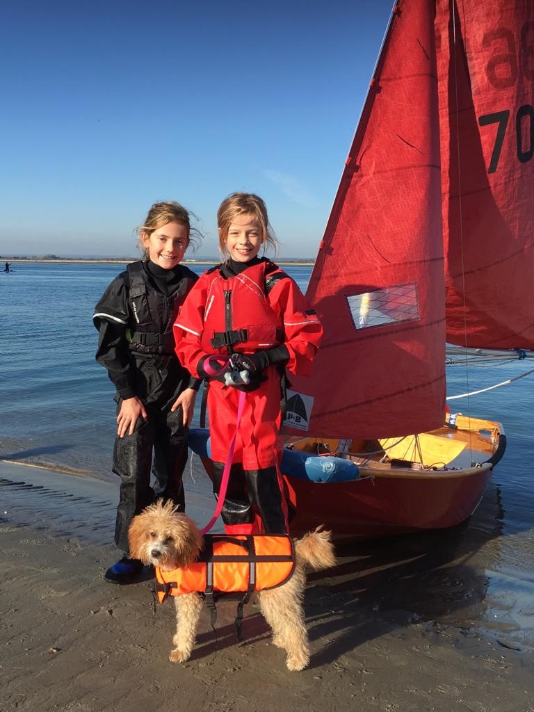 Mabel the dog with new family sailing