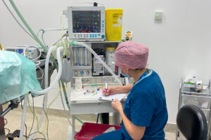 Nurse monitoring a patient's anaesthesia